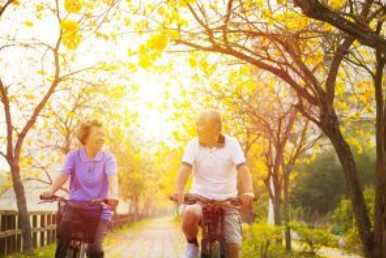 Two people cycling